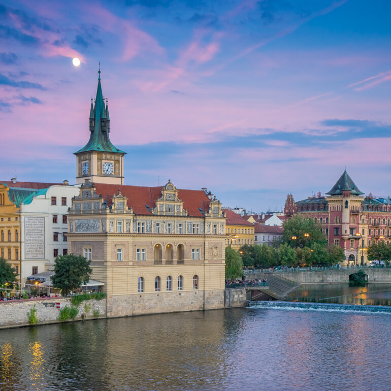 A view of a building in Prague across the Vltava River