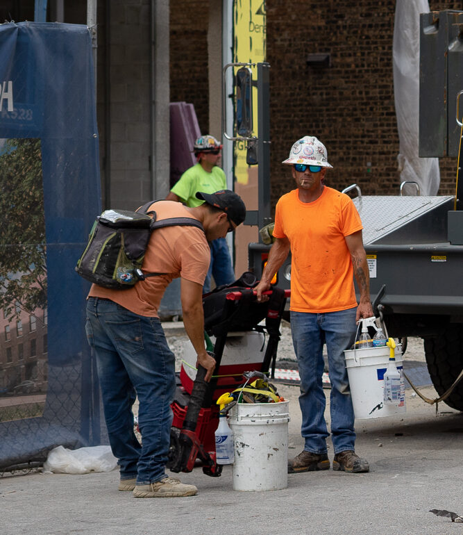 Two union construction worker after the end of their day.